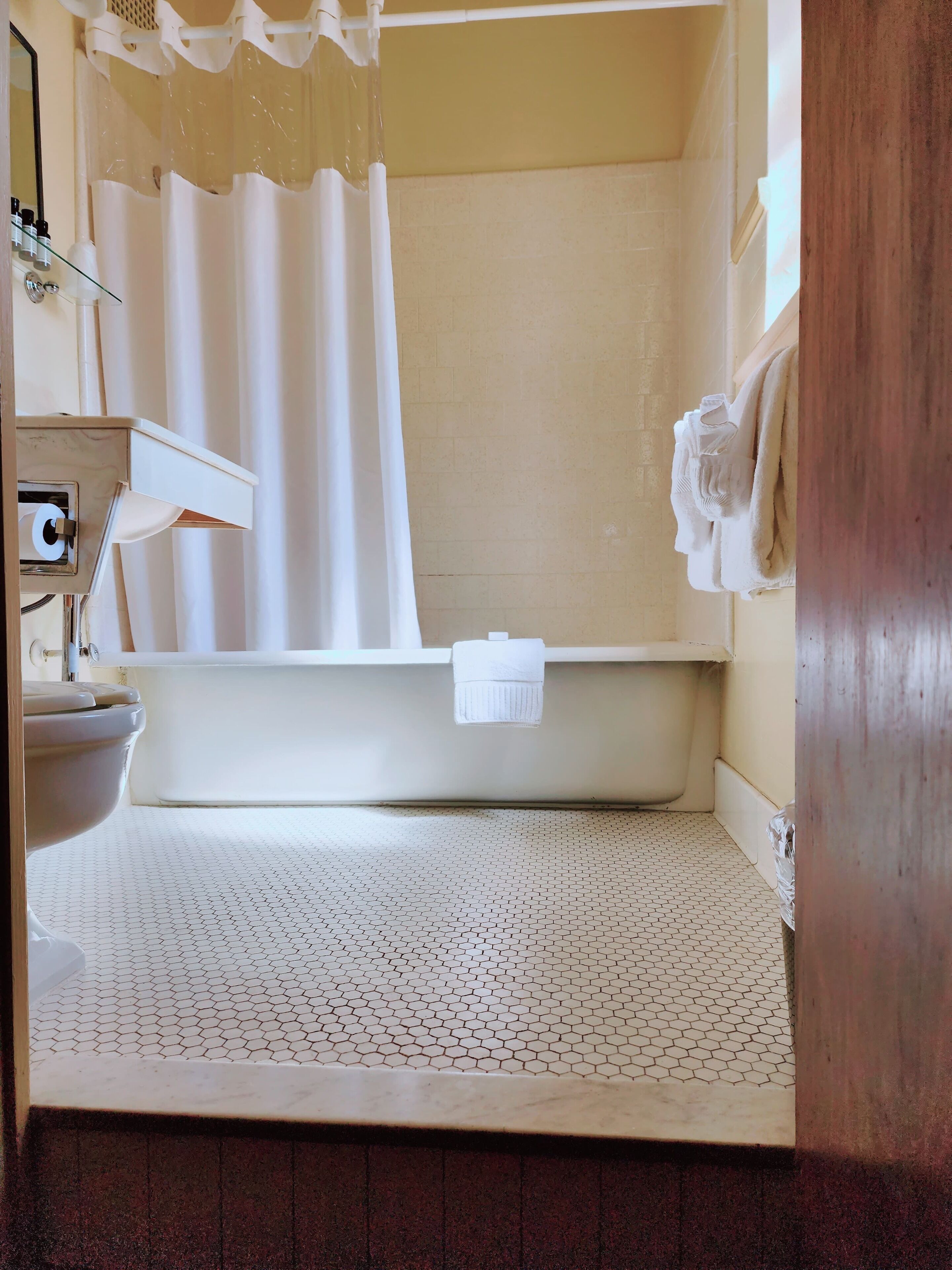 room, 1 king bed | bathroom | hair dryer, towels, soap, shampoo