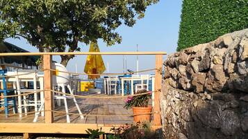 Breakfast, lunch, dinner served; beach views