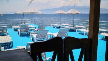 Breakfast, lunch, dinner served; beach views