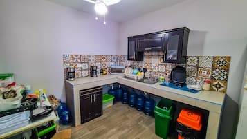 Fridge, microwave, coffee/tea maker, toaster