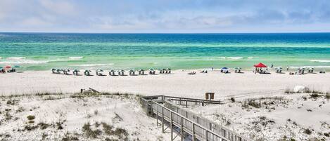 On the beach, sun-loungers, beach towels