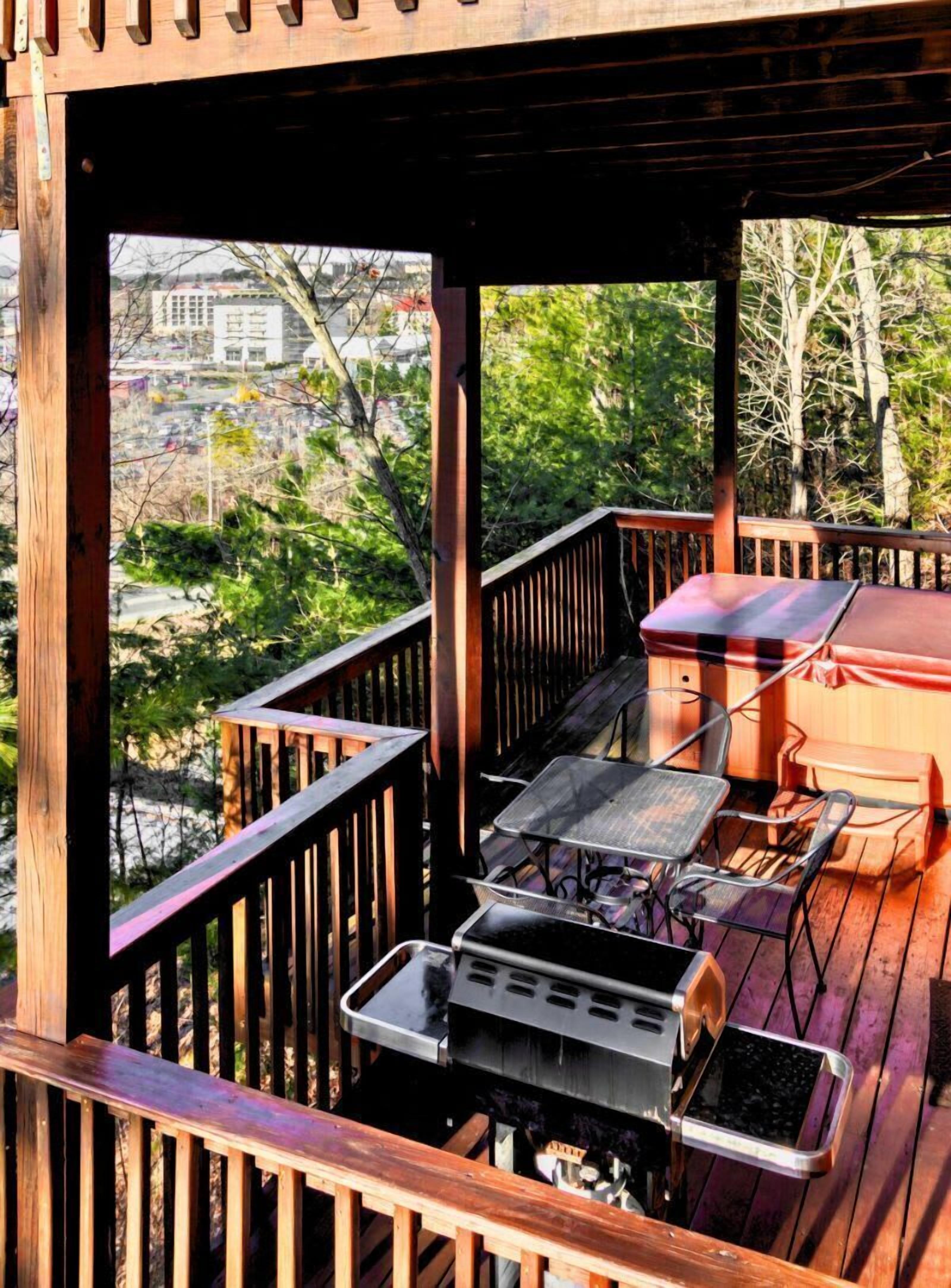 Kick back on the deck! Soak in the hot tub, and enjoy a little grilling under the sun!