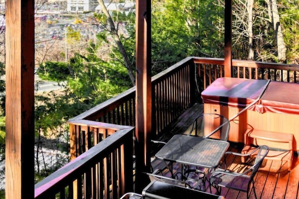 Kick back on the deck! Soak in the hot tub, and enjoy a little grilling under the sun!