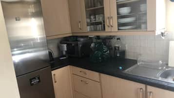 Apartment | Private kitchen | Fridge, microwave, oven, stovetop