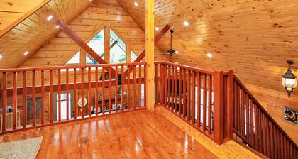 Gorgeous custom log cabin on 185 acres