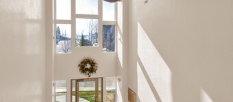 Two level condo with gourmet kitchen, upstairs remodel, and outdoor wonderland. 