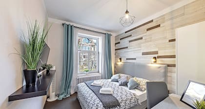 Nestled in the Quiet Hills of Prague
Suite 4, 2 BDRM 1 BA, sleeps 4
