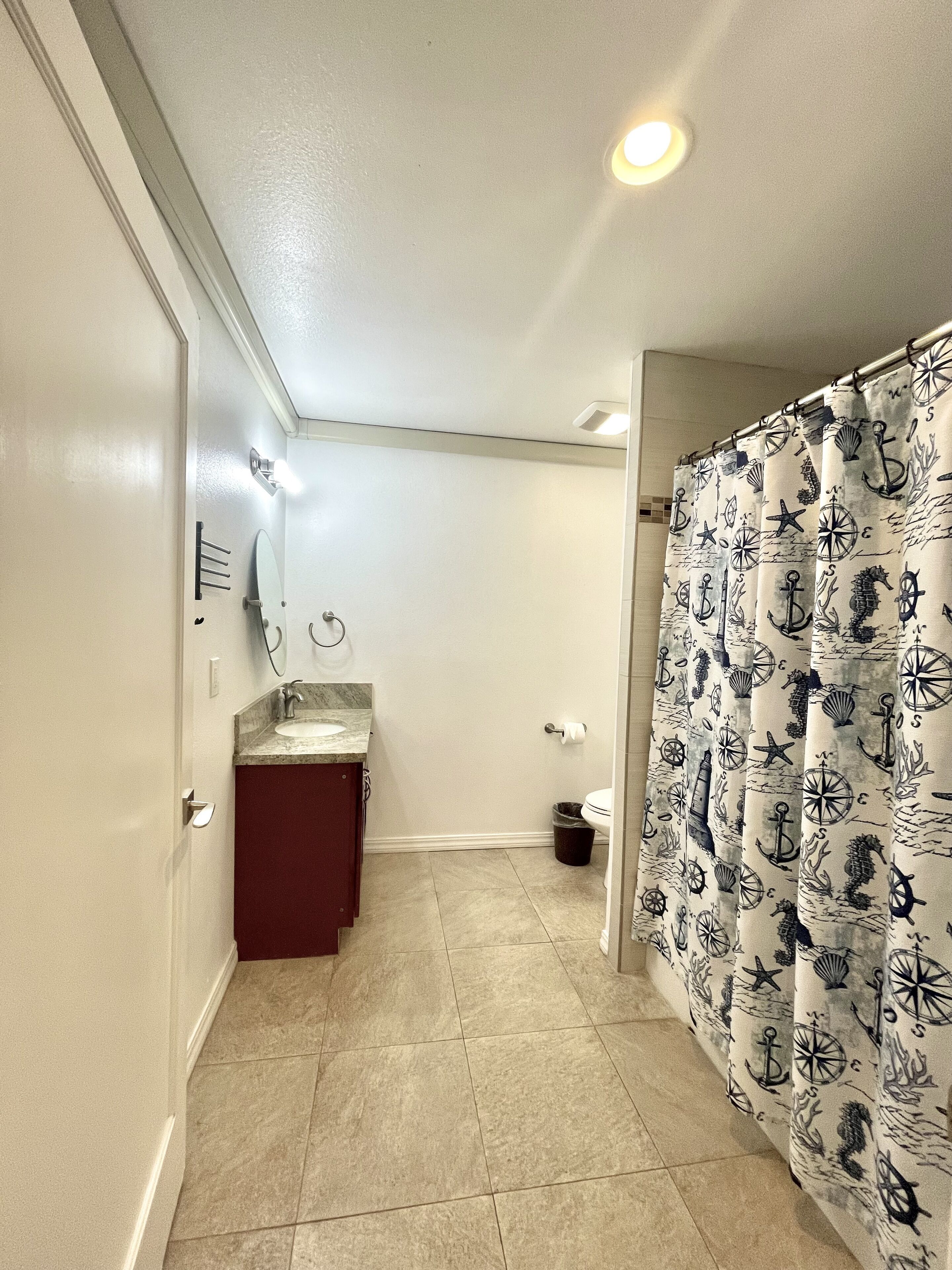 Combined shower/bathtub, hair dryer, towels, soap