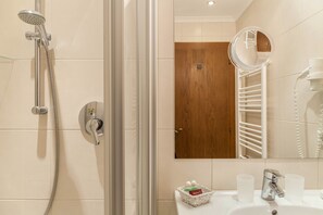 Shower, towels, toilet paper