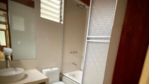 A bathroom with a sink, toilet, and shower. - SAYACMARCA CLASSIC INN (Machu Picchu)