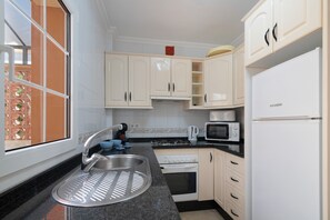 Fridge, microwave, oven, dishwasher