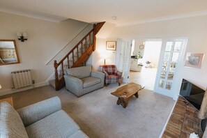 TV, fireplace, books, offices