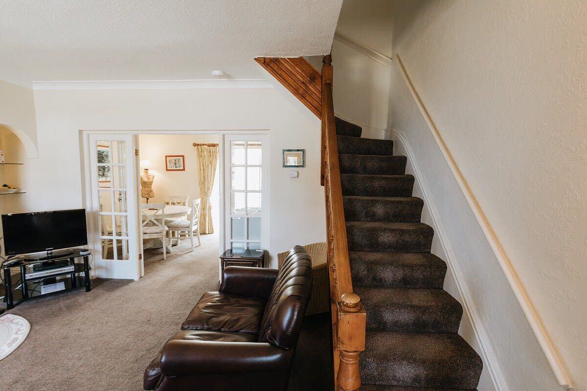 TV, fireplace, books, offices