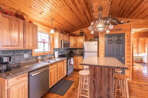 Fridge, microwave, oven, stovetop - Intimate and Inviting 2 bedroom cabin with Hot Tub and Private River Access (Steelville)