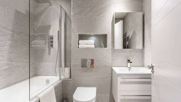Shower, free toiletries, hair dryer, towels