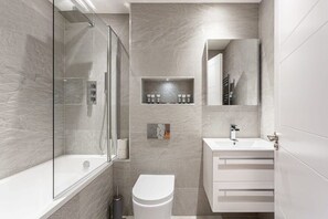 Shower, free toiletries, hair dryer, towels