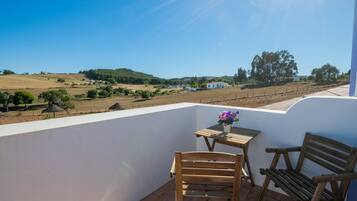 Family Room, Multiple Beds, Kitchenette, Pool View | Terrace/patio