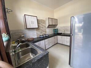 Fridge, microwave, stovetop, electric kettle