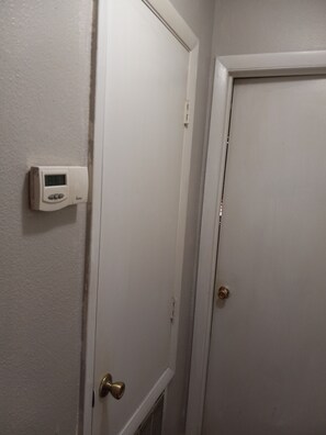 Two doors lead from this hallway, each with a white frame.