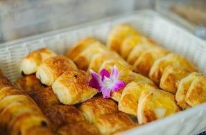 Daily buffet breakfast (USD 10 per person)
