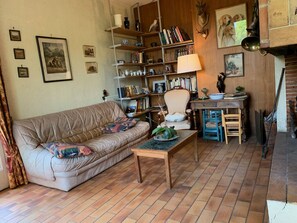 Fireplace, foosball, table tennis, books