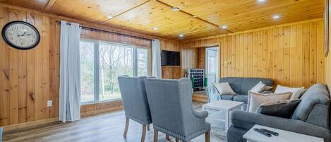 Smart TV, fireplace, foosball, books