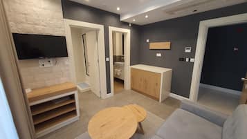 Superior Apartment, 1 Queen Bed with Sofa bed | Living area | 32-inch LCD TV with cable channels, TV