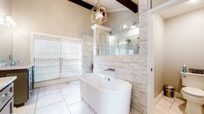 Shower, jetted tub, hair dryer, towels