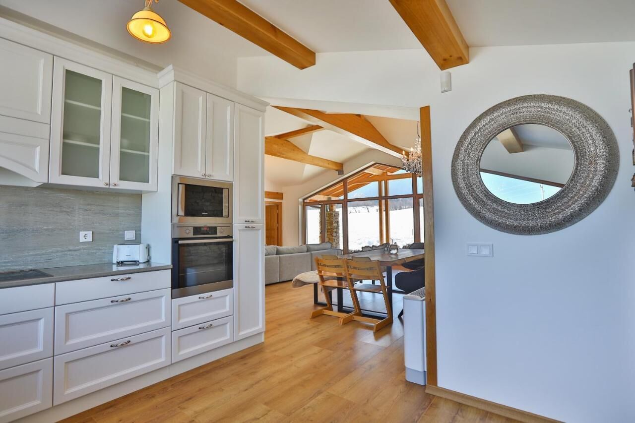 Luxury Chalet, 3 Bedrooms, Sauna, Mountain View | Private kitchen | High chair