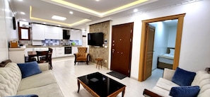 Economy Apartment, 3 Bedrooms, Kitchen | Living room