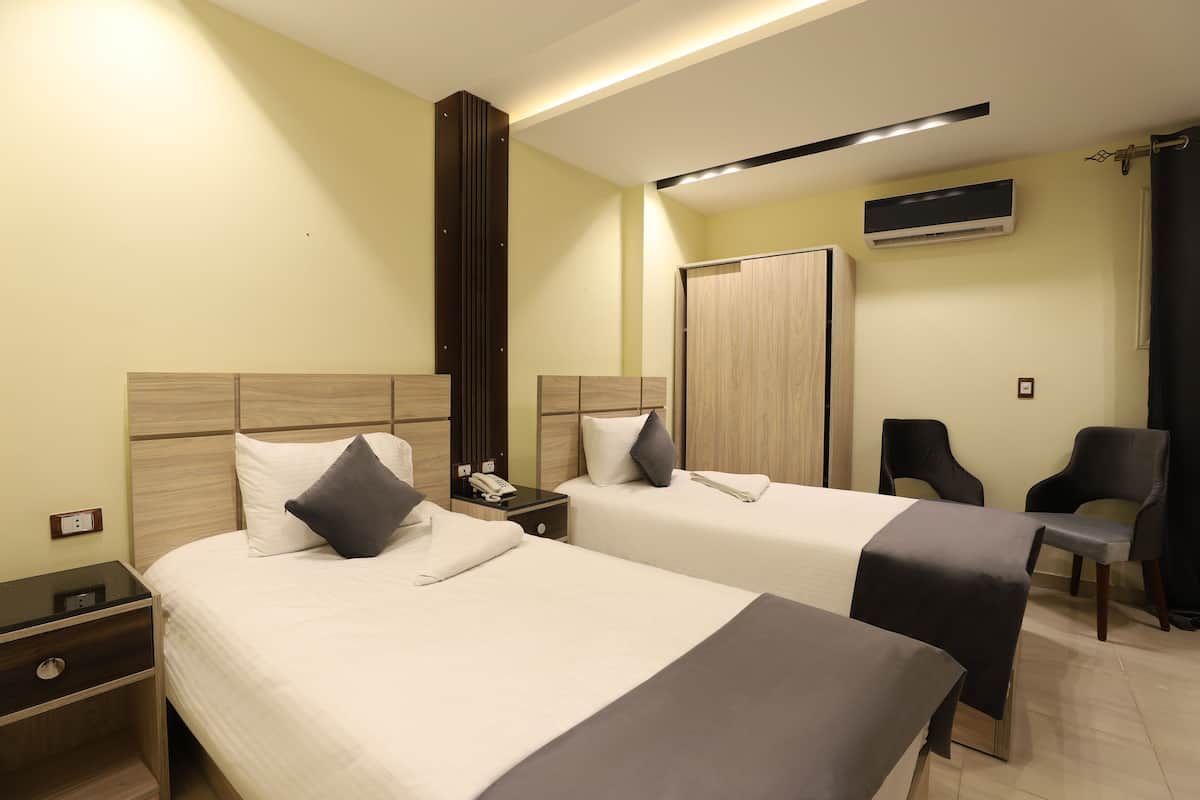 Deluxe Room | Premium bedding, free minibar, in-room safe, blackout drapes