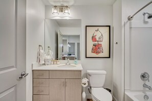 Combined shower/bathtub, hair dryer, towels, soap