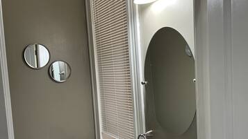 Combined shower/tub, hair dryer, towels, soap