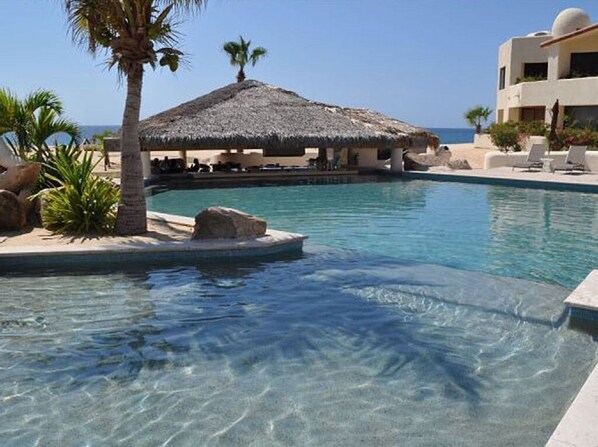 Outdoor pool, a heated pool - Oceanfront Terrasol Condo with Patio Fireplace (Cabo San Lucas)