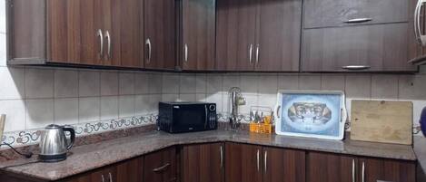 Fridge, microwave, stovetop, electric kettle