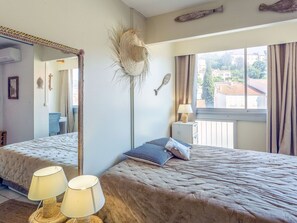 1 quarto, berço de viagem, Wi-Fi de cortesia, roupa de cama