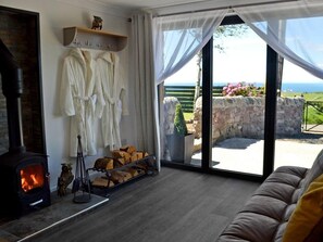 Appartamento, 1 letto king | Area soggiorno