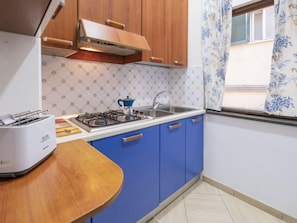 Fridge, microwave, toaster, high chair