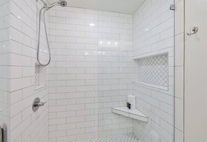 Bathtub, hair dryer, towels, soap