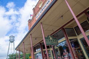 A brick building with a sign for H.P. Gruene Antique Company. - Old Mills Resort OM A11 2 Bedroom Condo by RedAwning (New Braunfels)