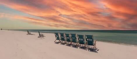 On the beach, sun-loungers, beach towels