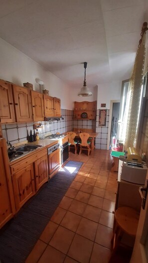 Apartamento | Cozinha privada | Geladeira, fogão, lava-louças, torradeira