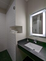 Shower, rainfall showerhead, hair dryer, towels