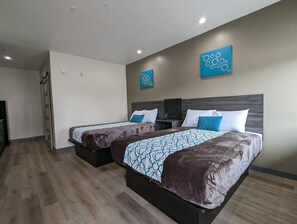 Deluxe Double Room | Desk, laptop workspace, blackout drapes, iron/ironing board