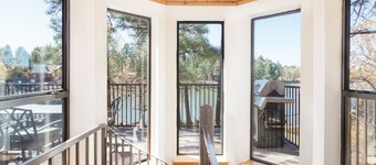 Luxury Waterfront Cabin at Rainbow Lake w/AC, Hot Tub, Game Room, Dock & Kayaks