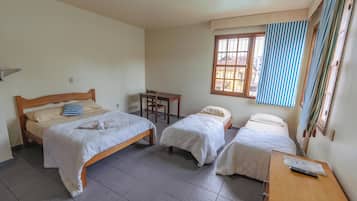 Desk, laptop workspace, free WiFi, bed sheets