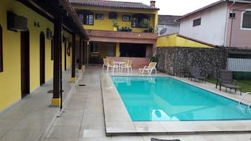 2 outdoor pools, open 10:00 AM to 8:00 PM, pool umbrellas, pool loungers