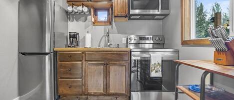 Fridge, microwave, coffee/tea maker, toaster