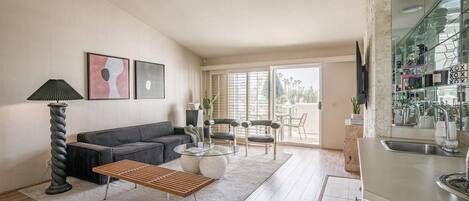 Smart TV, fireplace, books, printers