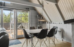 Enjoy meals in the spacious dining area with a view of the backyard through the large sliding glass door.
